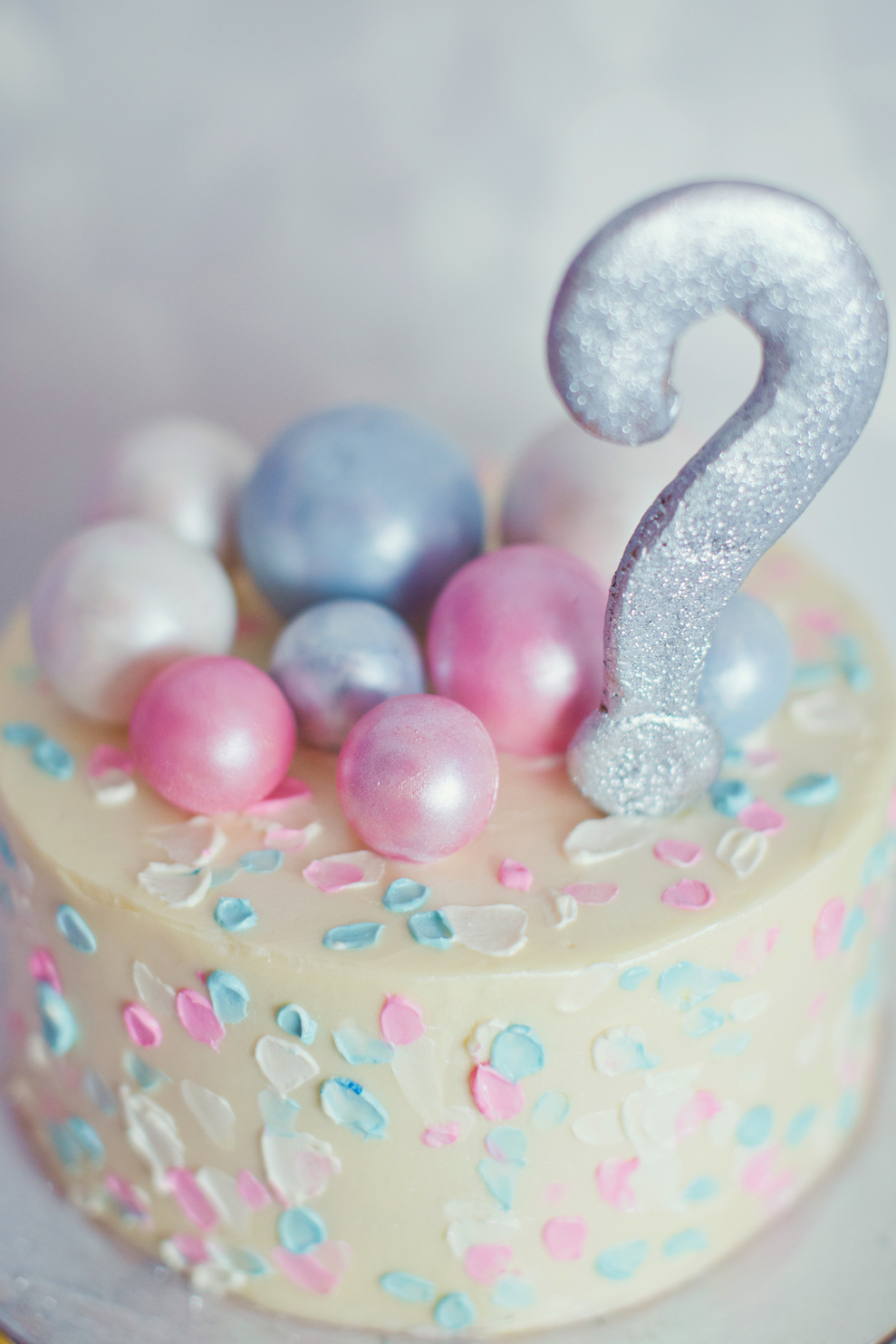 "Boy or girl" cake and different treats for gender reveal party