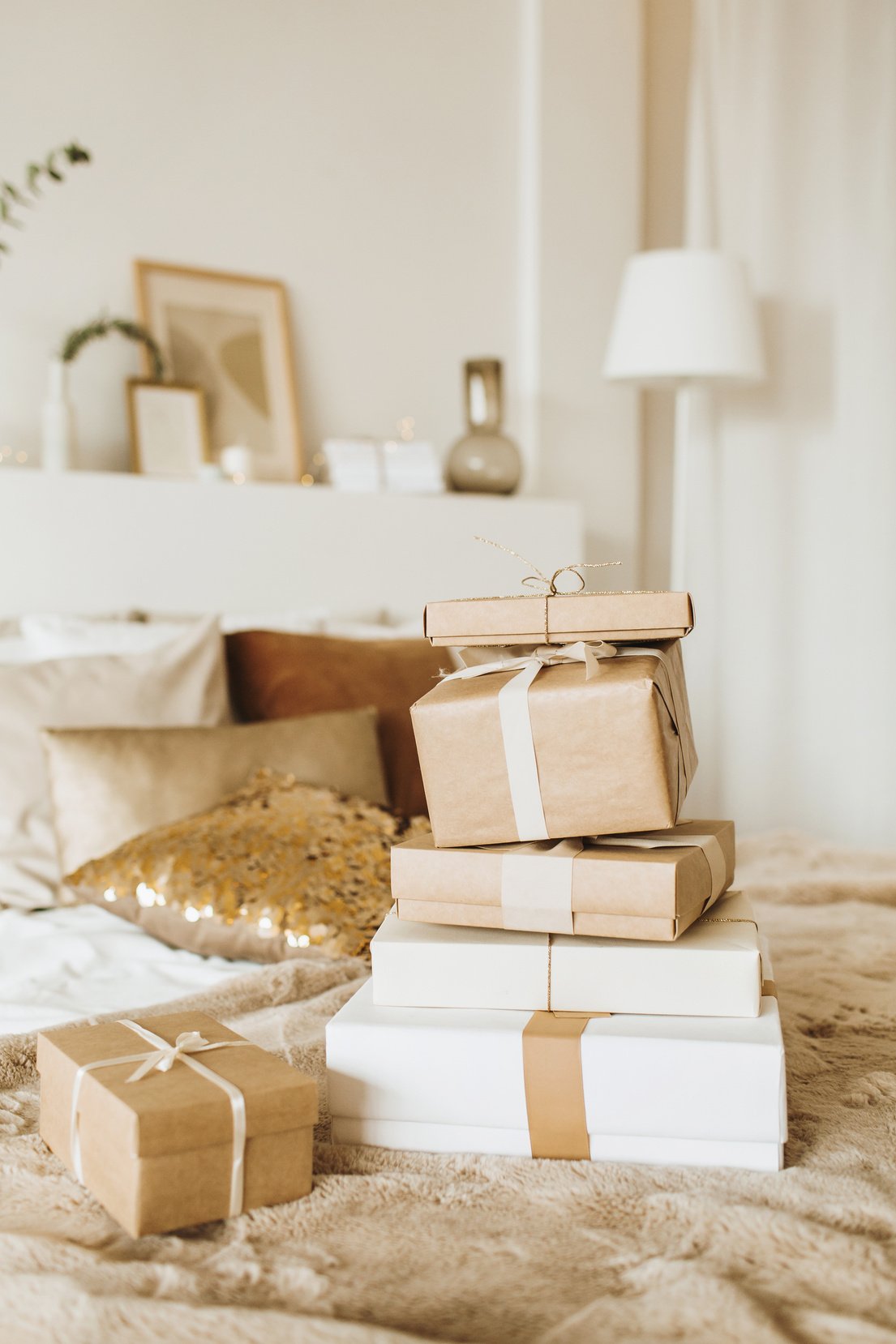 Bed with Stack of Gifts